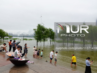 The Hankou Riverbank Park of the Yangtze River is flooding in Wuhan, China, on June 29, 2024. Heavy rain is continuing in Wuhan. (