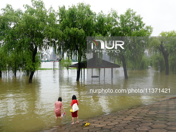 The Hankou Riverbank Park of the Yangtze River is flooding in Wuhan, China, on June 29, 2024. Heavy rain is continuing in Wuhan. 