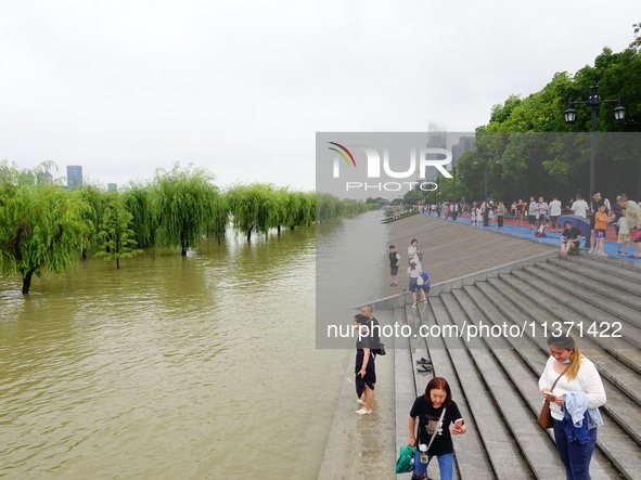 The Hankou Riverbank Park of the Yangtze River is flooding in Wuhan, China, on June 29, 2024. Heavy rain is continuing in Wuhan. 