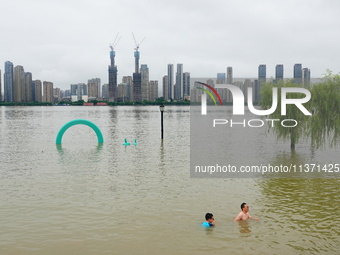 The Hankou Riverbank Park of the Yangtze River is flooding in Wuhan, China, on June 29, 2024. Heavy rain is continuing in Wuhan. (