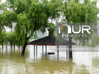 The Hankou Riverbank Park of the Yangtze River is flooding in Wuhan, China, on June 29, 2024. Heavy rain is continuing in Wuhan. (