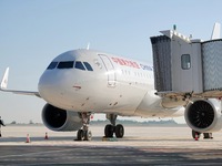 Ground staff are making preparations for a China Eastern Airlines A320 at Yantai Penglai International Airport in Yantai, China, on June 28,...