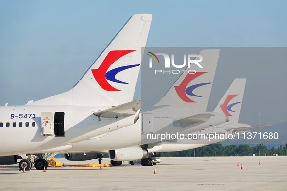 A China Eastern passenger jet is being seen on the tarmac at Yantai Penglai International Airport in Yantai, China, on June 28, 2024. 