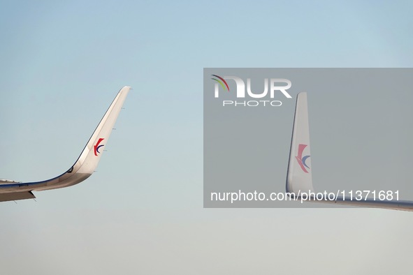 A China Eastern passenger jet is being seen on the tarmac at Yantai Penglai International Airport in Yantai, China, on June 28, 2024. 