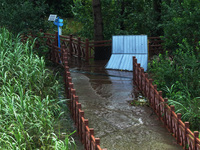 A flooded walkway is being seen after the Yangtze River is exceeding its warning level in Nanjing, Jiangsu province, China, on June 30, 2024...