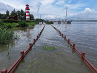 A flooded walkway is being seen after the Yangtze River is exceeding its warning level in Nanjing, Jiangsu province, China, on June 30, 2024...