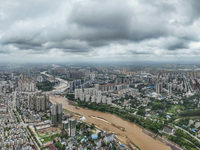 A photo is showing the construction site near Baotong Bridge of Shajing Qinjiang Bridge in Qinzhou, China, on June 29, 2024. (