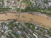 A photo is showing the construction site near Baotong Bridge of Shajing Qinjiang Bridge in Qinzhou, China, on June 29, 2024. (