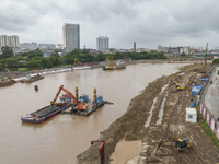 A photo is showing the construction site near Baotong Bridge of Shajing Qinjiang Bridge in Qinzhou, China, on June 29, 2024. (