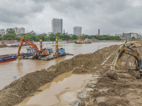 A photo is showing the construction site near Baotong Bridge of Shajing Qinjiang Bridge in Qinzhou, China, on June 29, 2024. (