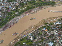 A photo is showing the construction site near Baotong Bridge of Shajing Qinjiang Bridge in Qinzhou, China, on June 29, 2024. (