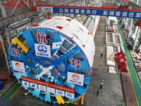 The large-diameter shield machine for the high-speed railway tunnel at Xiaoshan International Airport is being delivered off the production...