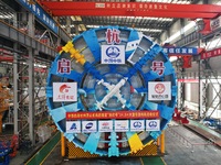 The large-diameter shield machine for the high-speed railway tunnel at Xiaoshan International Airport is being delivered off the production...