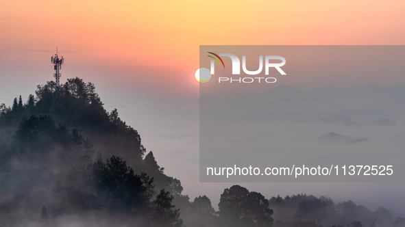 Advection fog is being seen in a mountain village in Chongqing, China, on June 30, 2024. 