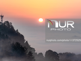 Advection fog is being seen in a mountain village in Chongqing, China, on June 30, 2024. (