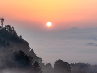 Advection fog is being seen in a mountain village in Chongqing, China, on June 30, 2024. (