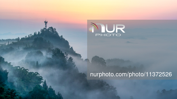 Advection fog is being seen in a mountain village in Chongqing, China, on June 30, 2024. 