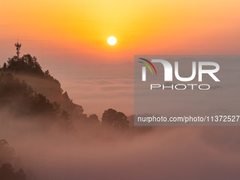 Advection fog is being seen in a mountain village in Chongqing, China, on June 30, 2024. (