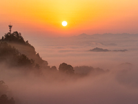 Advection fog is being seen in a mountain village in Chongqing, China, on June 30, 2024. (