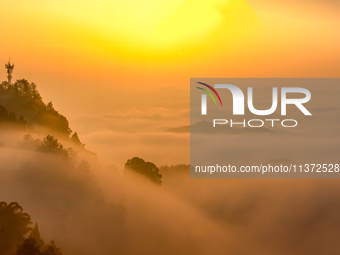 Advection fog is being seen in a mountain village in Chongqing, China, on June 30, 2024. (