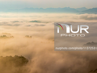 Advection fog is being seen in a mountain village in Chongqing, China, on June 30, 2024. (