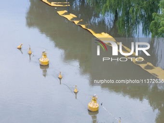 The water level of the Yangtze River is rising above the warning line in Nanjing, China, on June 30, 2024. (