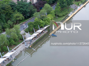 The water level of the Yangtze River is rising above the warning line in Nanjing, China, on June 30, 2024. (