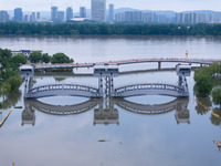 The water level of the Yangtze River is rising above the warning line in Nanjing, China, on June 30, 2024. (