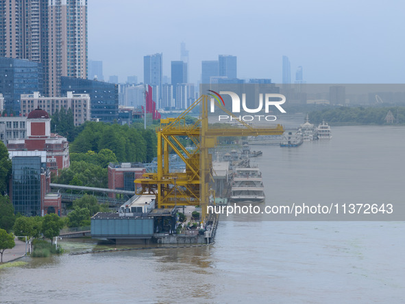 The water level of the Yangtze River is rising above the warning line in Nanjing, China, on June 30, 2024. 