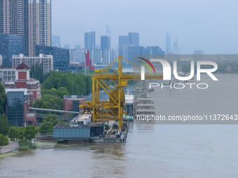 The water level of the Yangtze River is rising above the warning line in Nanjing, China, on June 30, 2024. (