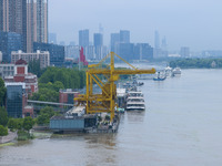 The water level of the Yangtze River is rising above the warning line in Nanjing, China, on June 30, 2024. (