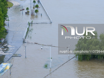 The water level of the Yangtze River is rising above the warning line in Nanjing, China, on June 30, 2024. (