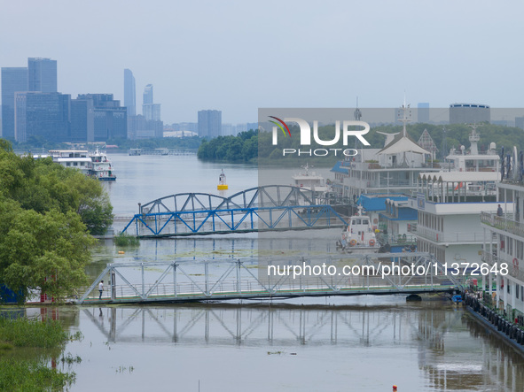 The water level of the Yangtze River is rising above the warning line in Nanjing, China, on June 30, 2024. 