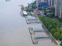 The water level of the Yangtze River is rising above the warning line in Nanjing, China, on June 30, 2024. (