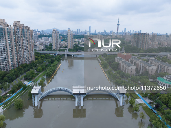 The water level of the Yangtze River is rising above the warning line in Nanjing, China, on June 30, 2024. 