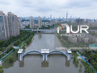 The water level of the Yangtze River is rising above the warning line in Nanjing, China, on June 30, 2024. (