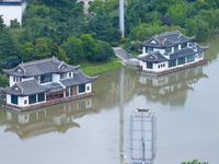 The water level of the Yangtze River is rising above the warning line in Nanjing, China, on June 30, 2024. (