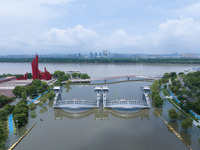 The water level of the Yangtze River is rising above the warning line in Nanjing, China, on June 30, 2024. (