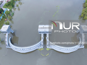 The water level of the Yangtze River is rising above the warning line in Nanjing, China, on June 30, 2024. (