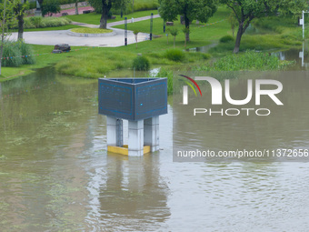 The water level of the Yangtze River is rising above the warning line in Nanjing, China, on June 30, 2024. (