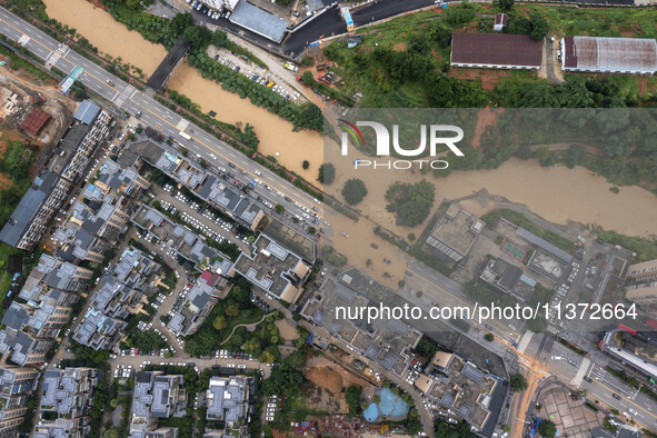 Waterlogging is occurring in Congjiang County, Guizhou Province, in Congjiang, China, on June 30, 2024. 