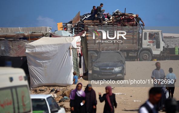 Palestinians are fleeing the al-Mawasi area in western Rafah, in Rafah, Palestine, on June 30, 2024, amid the ongoing conflict between Israe...