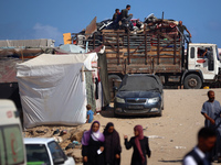 Palestinians are fleeing the al-Mawasi area in western Rafah, in Rafah, Palestine, on June 30, 2024, amid the ongoing conflict between Israe...