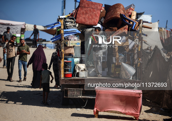 Palestinians are fleeing the al-Mawasi area in western Rafah, in Rafah, Palestine, on June 30, 2024, amid the ongoing conflict between Israe...