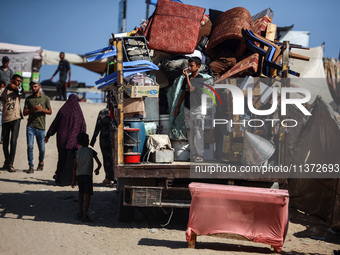 Palestinians are fleeing the al-Mawasi area in western Rafah, in Rafah, Palestine, on June 30, 2024, amid the ongoing conflict between Israe...