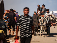 Palestinians are fleeing the al-Mawasi area in western Rafah, in Rafah, Palestine, on June 30, 2024, amid the ongoing conflict between Israe...