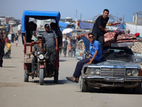 Palestinians are fleeing the al-Mawasi area in western Rafah, in Rafah, Palestine, on June 30, 2024, amid the ongoing conflict between Israe...