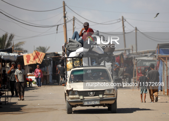 Palestinians are fleeing the al-Mawasi area in western Rafah, in Rafah, Palestine, on June 30, 2024, amid the ongoing conflict between Israe...