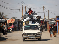 Palestinians are fleeing the al-Mawasi area in western Rafah, in Rafah, Palestine, on June 30, 2024, amid the ongoing conflict between Israe...