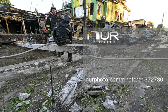 Rescuers are partaking in a response effort to the Russian missile attack in central Vilniansk, Zaporizhzhia region, southern Ukraine, on Ju...